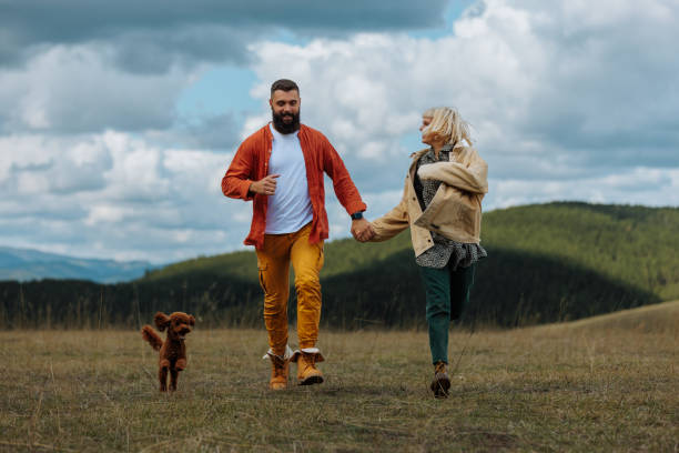 istock Happy couple enjoying mountain vacation. 1434670040