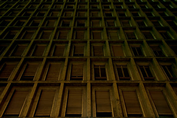 Windows of an Ancient Building at Night. Architecture in Milano, Italy