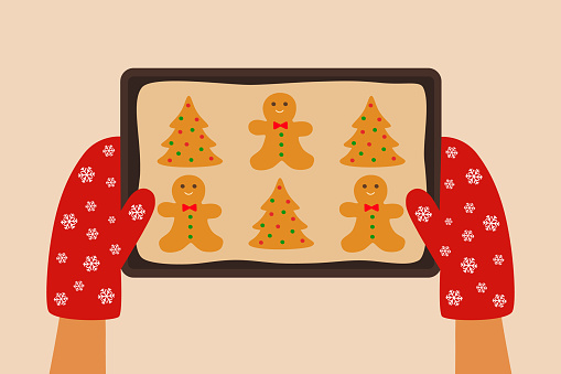 High Angle View Of Hands Holding Baking Tray With Christmas Gingerbread Cookies