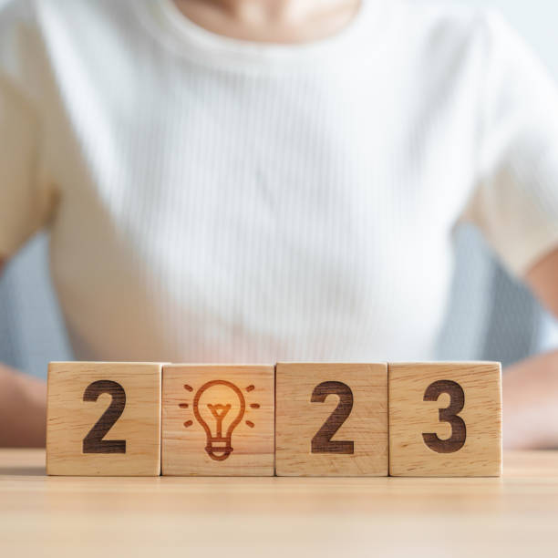 istock 2023 block with lightbulb. Business Idea, Creative, Thinking, brainstorm, Goal, Resolution, strategy, plan, Action, change and New Year start concepts 1434680328