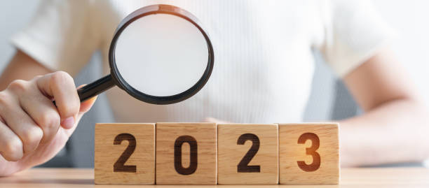 istock 2023 block with magnifying glass. SEO, Search Engine Optimization, hiring , Advertising, Idea, Strategy, marketing, Keyword, Content and New Year start concepts 1434680341