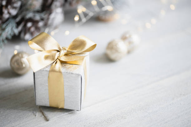 istock White and gold christmas presents 1434685129