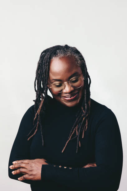 istock Professional woman with dreadlocks smiling happily in a studio 1434685594
