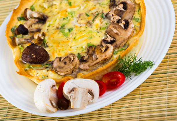 istock Delicious french  open pie with cheese and mushrooms 1434689708