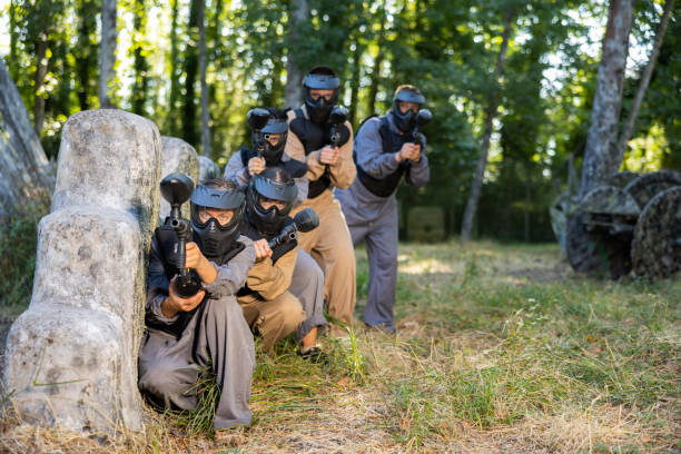 istock Team eliminating opponents on paintball field 1434690587