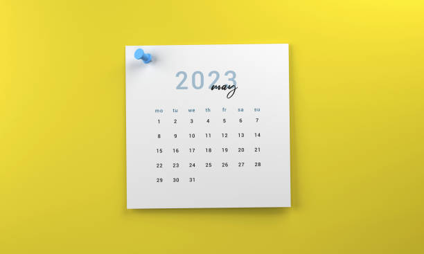 istock 2023 May Calendar Page On Yellow Background 1434692573