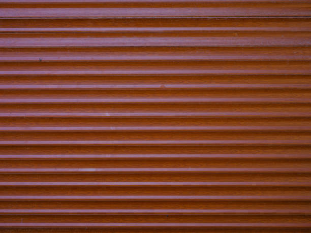 istock old metal shutter of a store 1434692594