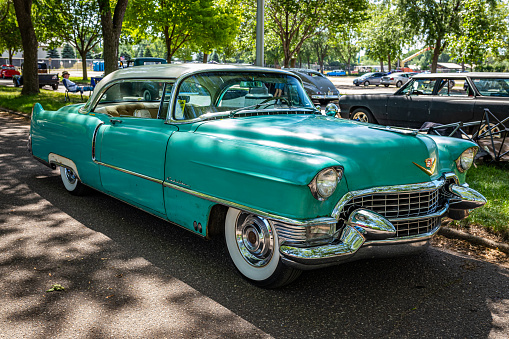 Falcon Heights, MN - June 19, 2022: High perspective front corner view of a 1955 Cadillac Series 62 Hardtop Coupe at a local car show.