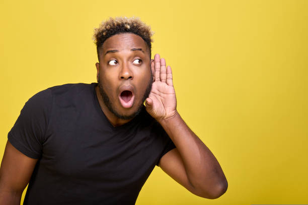 istock A stylish dark-skinned man in modern everyday clothes is very surprised 1434707636
