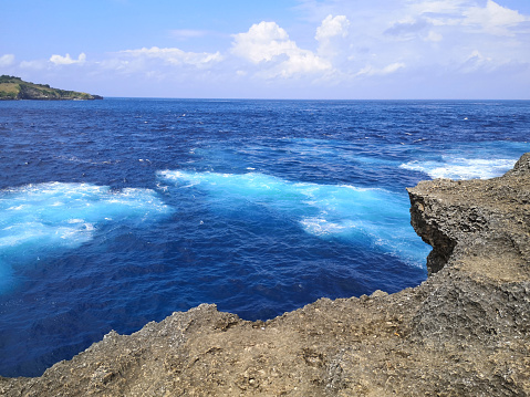 The cliffs at Angel Billabong, a famous site on the west coast of Nusa Penida island, Bali.