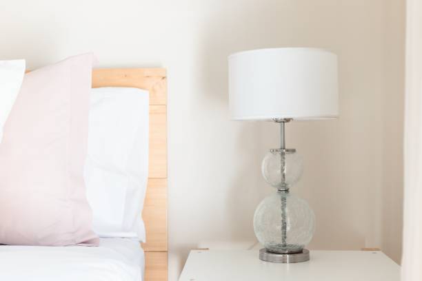 istock Beautiful white lamp on a nightstand 1434709917