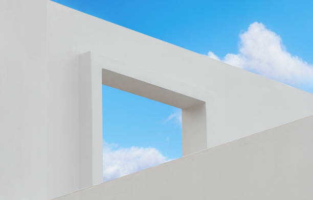 istock Wall texture of concrete with open window against blue sky and clouds, A part of White cement building, Anyt view Modern architecture. with summer sky, Minimalistic design 1434710708