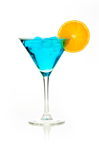 istock blue drink with ice cubes and orange slice on white background, isolated 1434716464