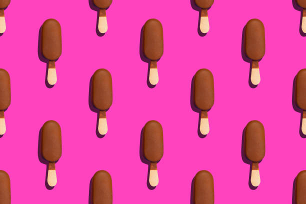 istock seamless pattern of a sweet and delicious chocolade glazed eskimo on a bright pink background 1434719108