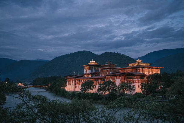 punakha dzong in late evening punakha dzong in late evening bhutanese culture photos stock pictures, royalty-free photos & images