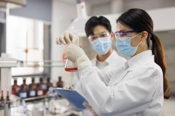 istock two scientists are working at chemical lab. 1434729833