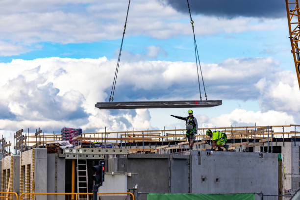 Copenhagen, Denmark Copenhagen, Denmark Sept 21, 2022 Construction workers and a crane in the modern  Orestad district. zealand denmark stock pictures, royalty-free photos & images