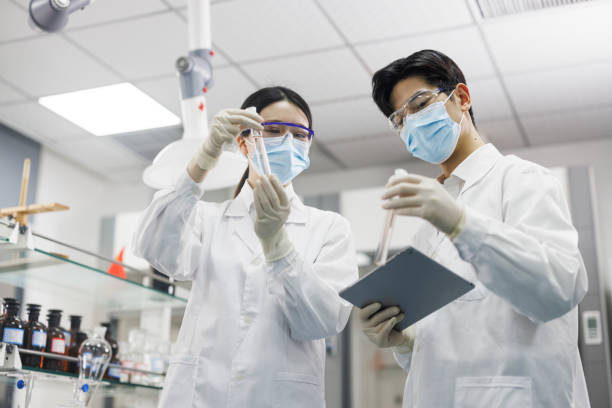 istock Scientists talk about research results in the laboratory 1434730359