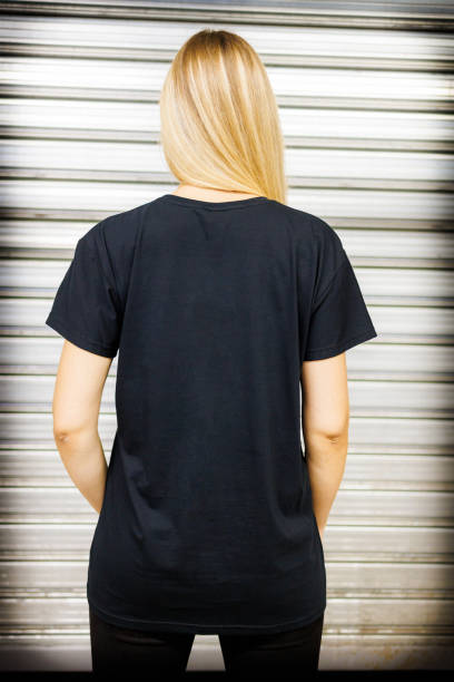 istock Rear view of woman wears black t-shirt 1434732403