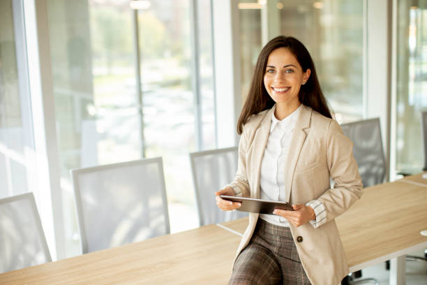 istock Young woman with digital tablet in the office 1434737651