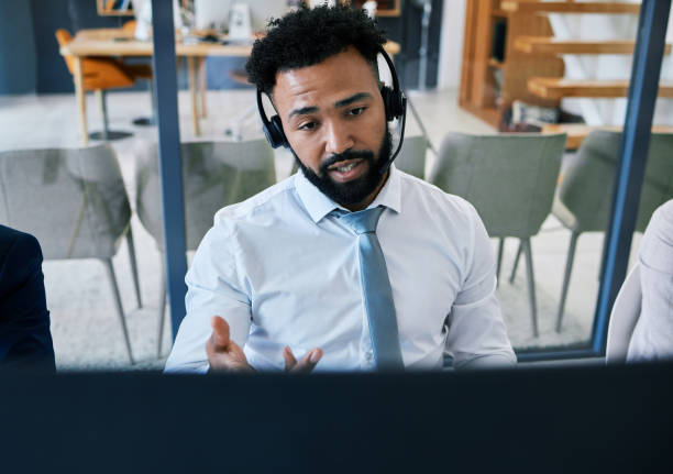 istock Consulting, communication and call center agent help, working and consultant with online IT problem. Man, ecommerce or customer support worker with contact us, telemarketing and customer service 1434737748