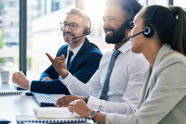 istock Teamwork, diversity and collaboration, a team of call centre employees working together. Men, woman and customer service, contact us for help. Telemarketing, consulting and communication with a smile 1434737753