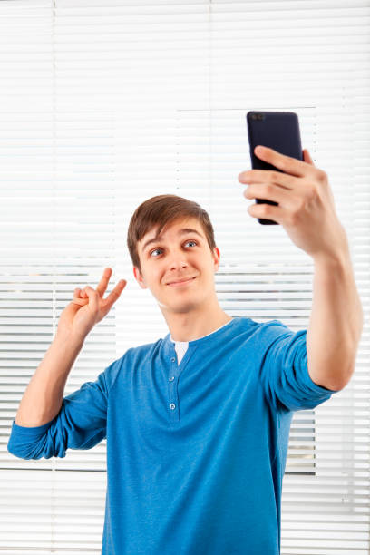 istock Young Man with a Phone 1434738890