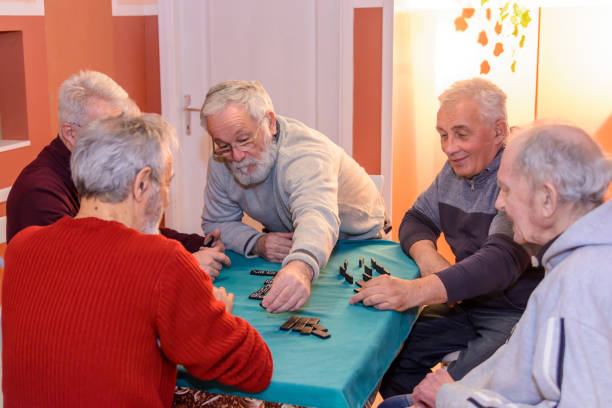 istock A small group of older people is playing dominoes. 1434742005