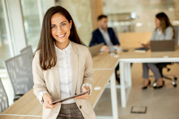 istock Young woman with digital tablet in the office 1434742591