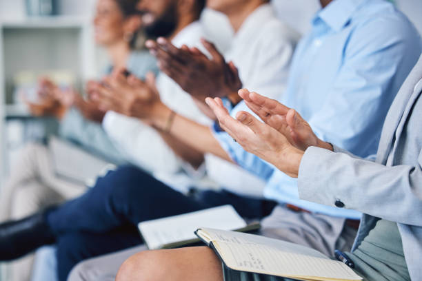 istock Work presentation, conference or trade show with business worker audience hands clapping. Trade show corporate convention event with job crowd celebration for workforce, success and career workshop 1434743868