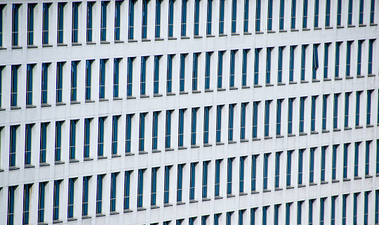 Reflection of modern building on glass or windows from other building.