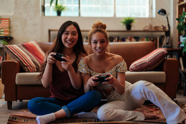 istock Gay girlfriends playing video games 1434754734