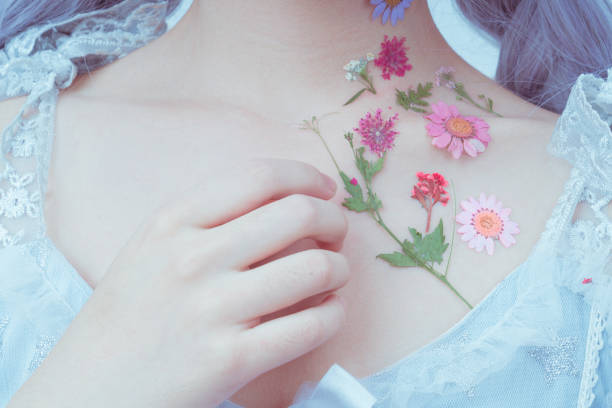 A girl's chest and flowers