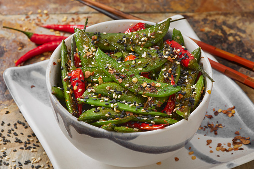 Stir Fried Sesame Snap Peas and Thai Chili Peppers with a Sweet Chili Sauce