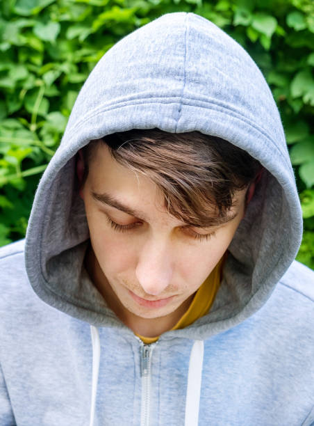 istock Sad Young Man outdoor 1434762470