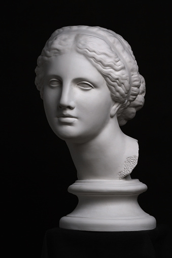 Plaster bust of Venus de milo isolatet on a black bakground. 3d image.