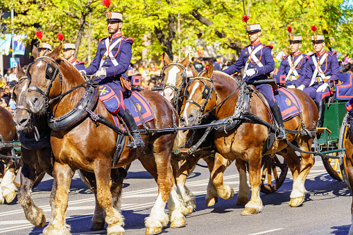 Madrid, Spain, October 12, 2022: Royal Guard on horseback parading through the streets of Madrid on Columbus Day