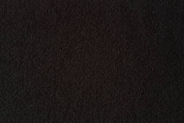 istock Black color felt textile fabric texture background. Top view 1434766313