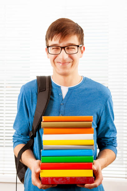 istock Young Man with a Books 1434770299
