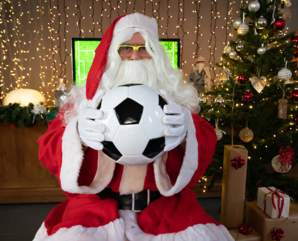 istock Santa Claus with Soccer ball 1434771715