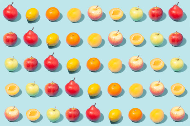 istock Creative summer background from different fruits on a light mint background. 1434773919