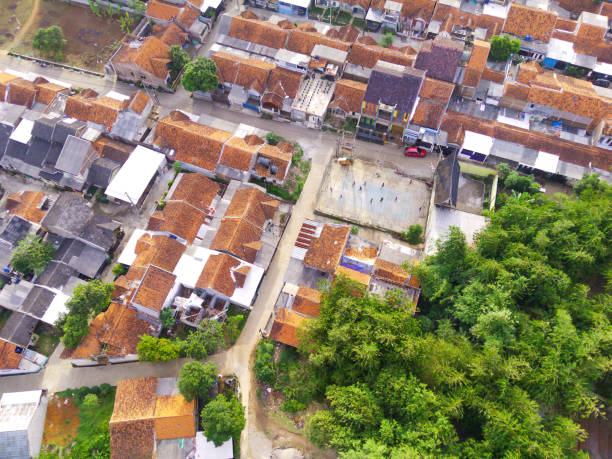 istock Aerial Cikancung area which is densely populated with houses and surrounded by rice fields 1434779594