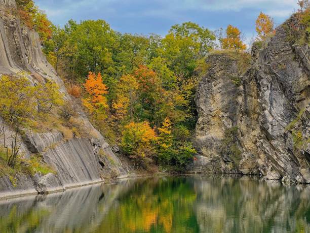 istock Reflection of the rocky cliff and trees 1434779989