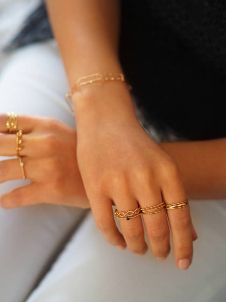 istock Gold rings accumulation on a woman hand 1434780785