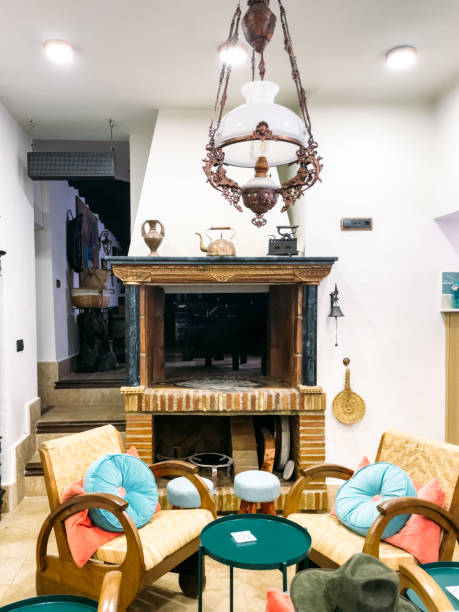 istock Old fireplace in living room 1434786620