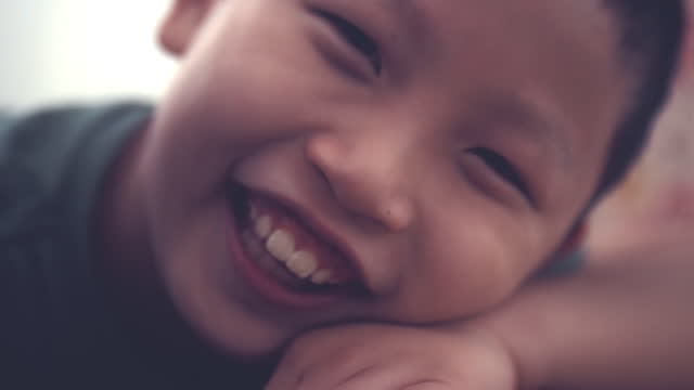 Smiling Asian boy / Headshot