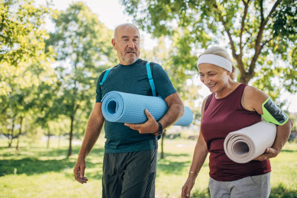 istock Yoga partners in park 1434790677