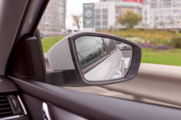 istock Side rear view mirror of the moving car. Toning 1434792245
