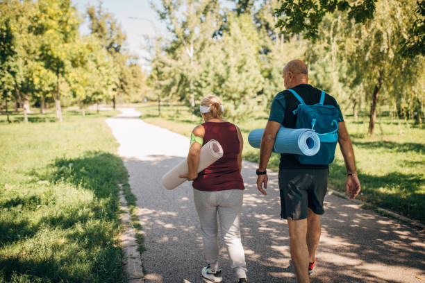 istock Mature couple going to exercise yoga 1434792373