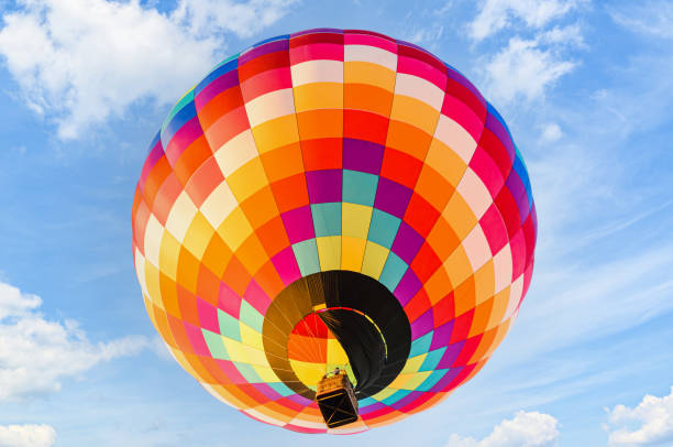 istock Hot air balloon flight over blue sky 1434794971